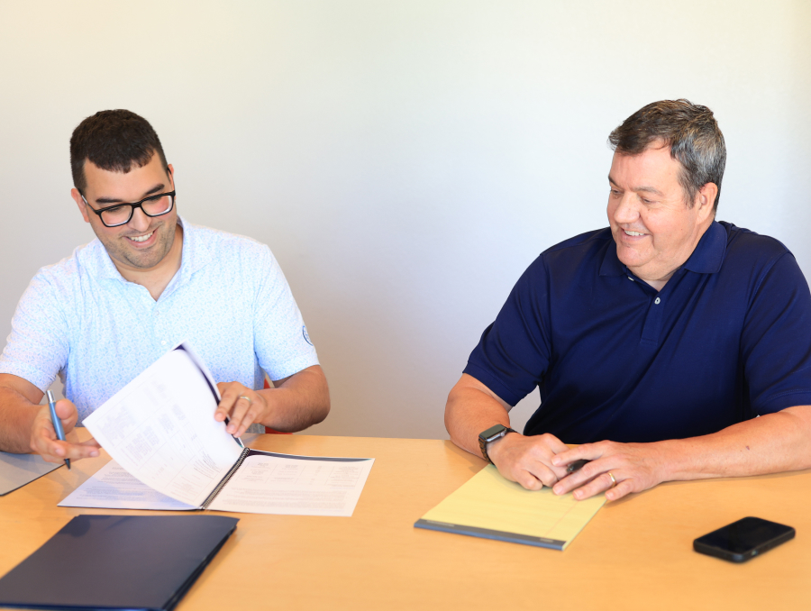 Fiduciary Advocates | dentist consulting with smiling patient